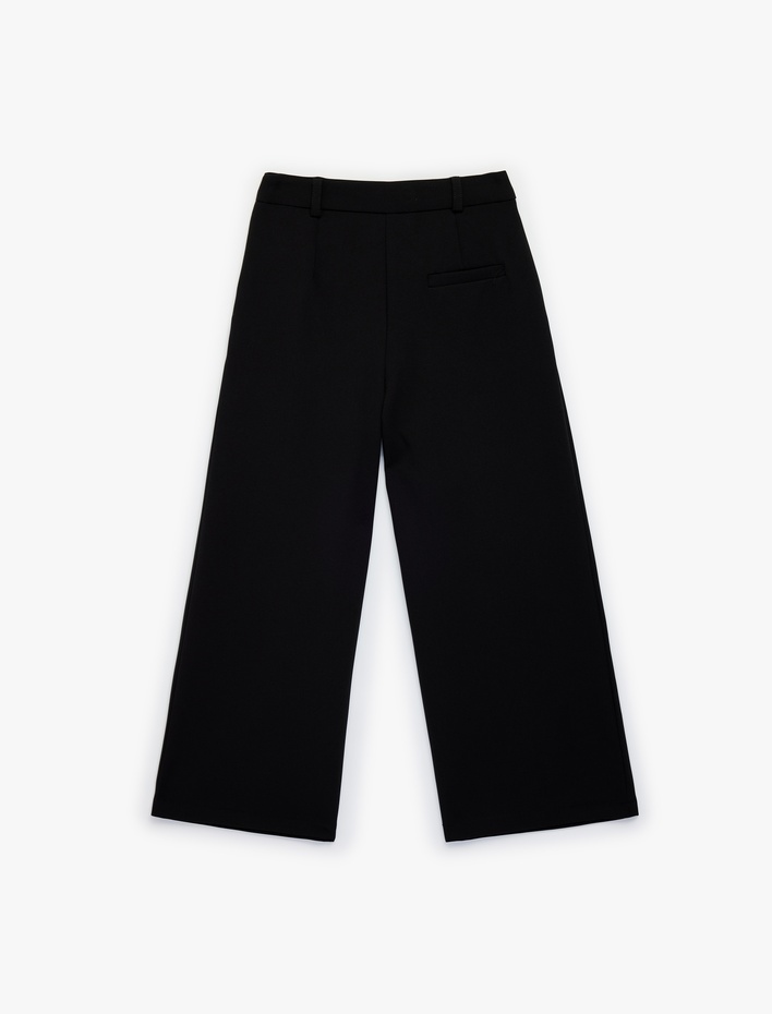 Kız Çocuk Beli Ayarlanabilir Lastikli Pile Detaylı Cepli Geniş Paça Kumaş Pantolon