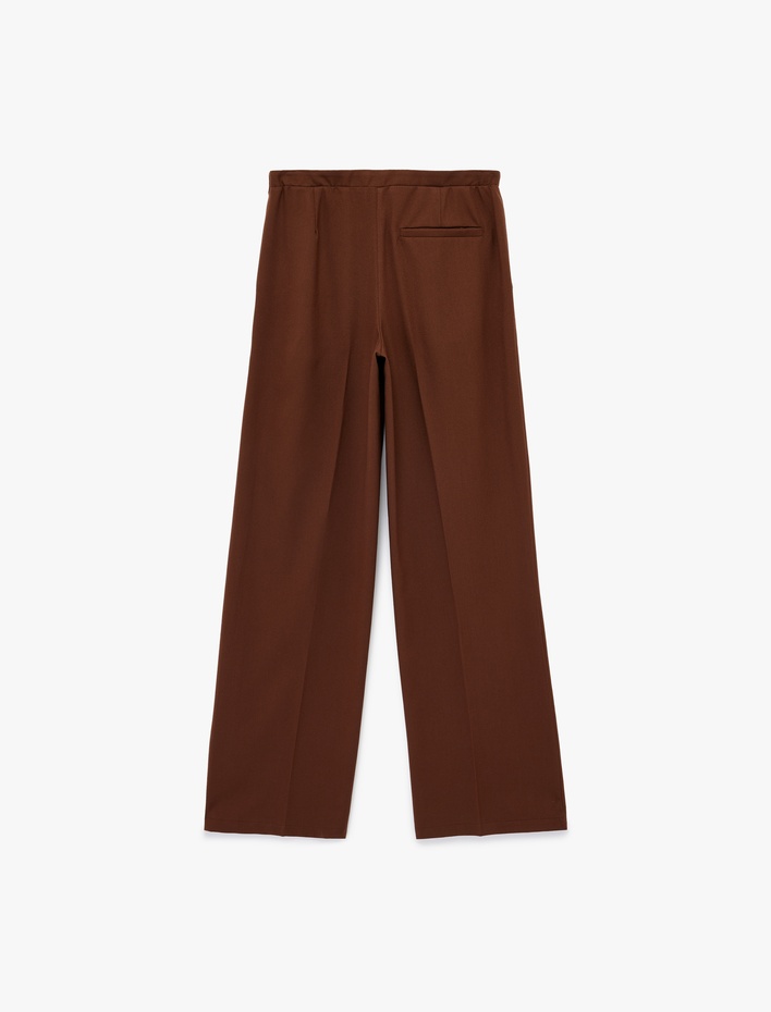  Pile Detaylı Beli Bağlamalı Cepli Geniş Paça Kumaş Pantolon