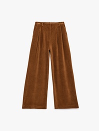 Koton X Sibil Çetinkaya - Cepli Pile Detaylı Geniş Paça Kadife Pantolon