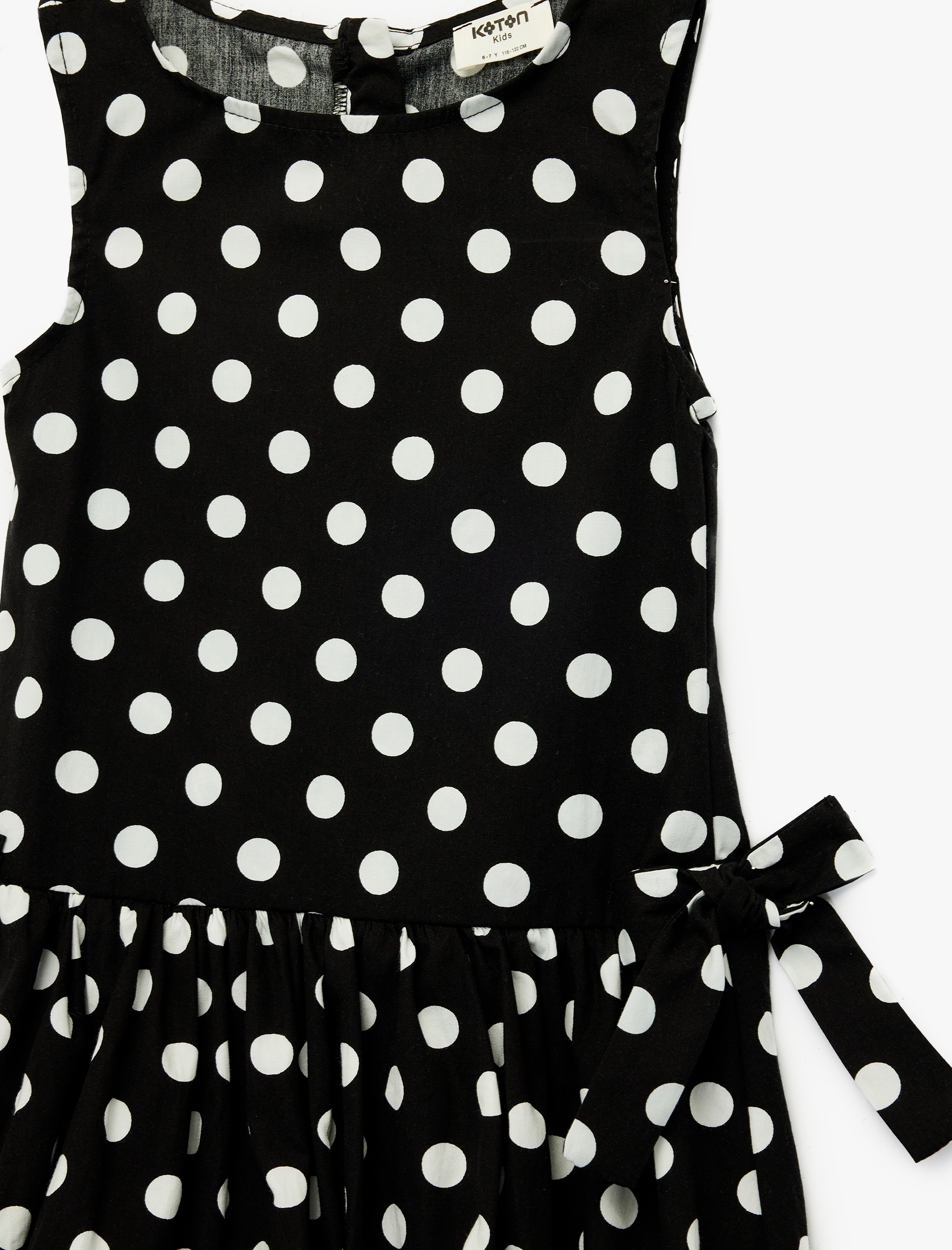  Kız Çocuk Pamuklu Bisiklet Yaka Kolsuz Fiyonk Detaylı Puantiyeli Balon Elbise