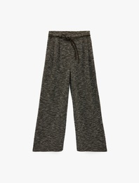 Desenli Kemer Detaylı Cepli Dokulu Pantolon