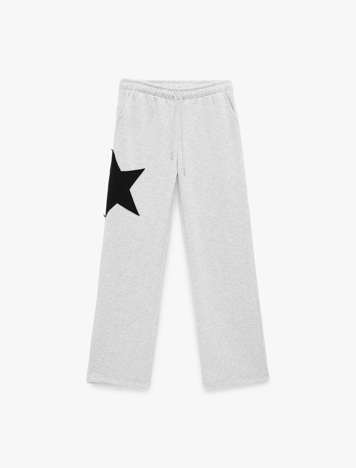  Cep Detaylı Beli Bağcıklı Yıldız Aplikeli Oversize Geniş Paça Eşofman Altı