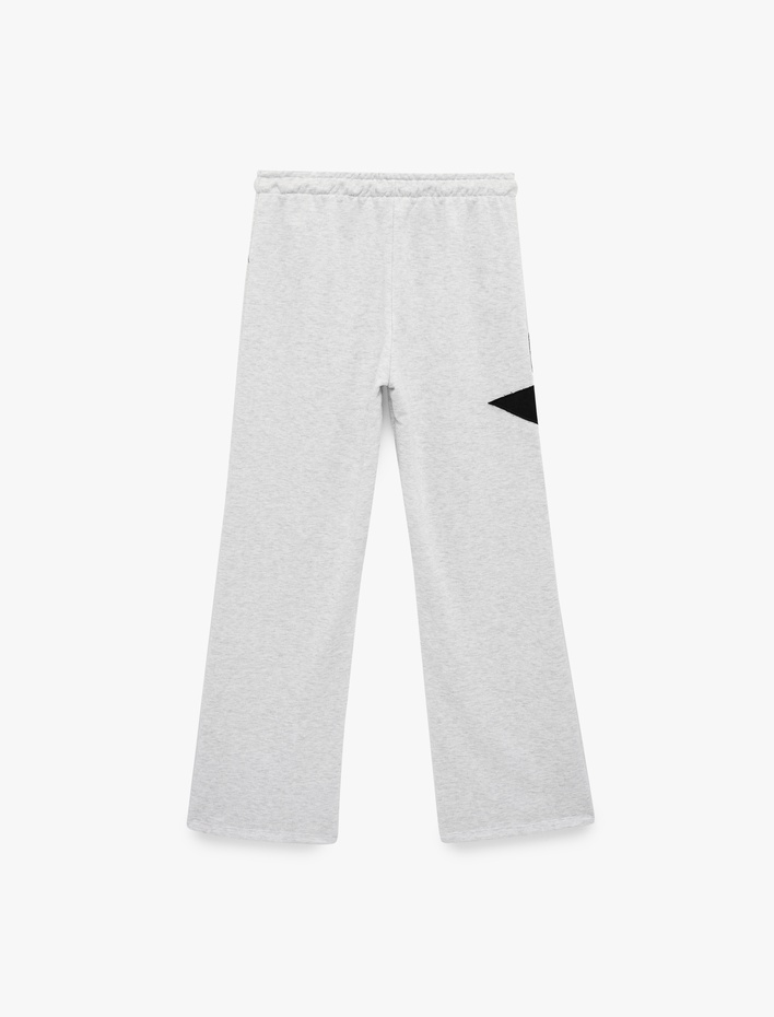  Cep Detaylı Beli Bağcıklı Yıldız Aplikeli Oversize Geniş Paça Eşofman Altı