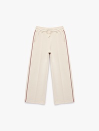Pamuklu Cep Detaylı Beli Bağlamalı Geniş Paça Pantolon