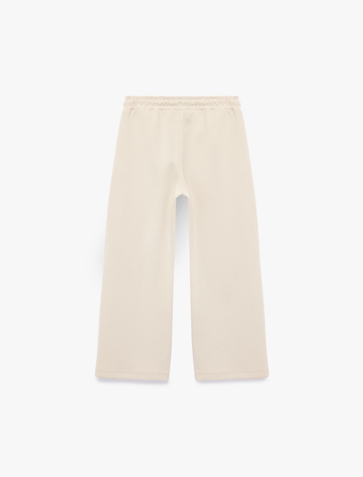 Kız Çocuk Pamuklu Cep Detaylı Beli Bağlamalı Geniş Paça Pantolon