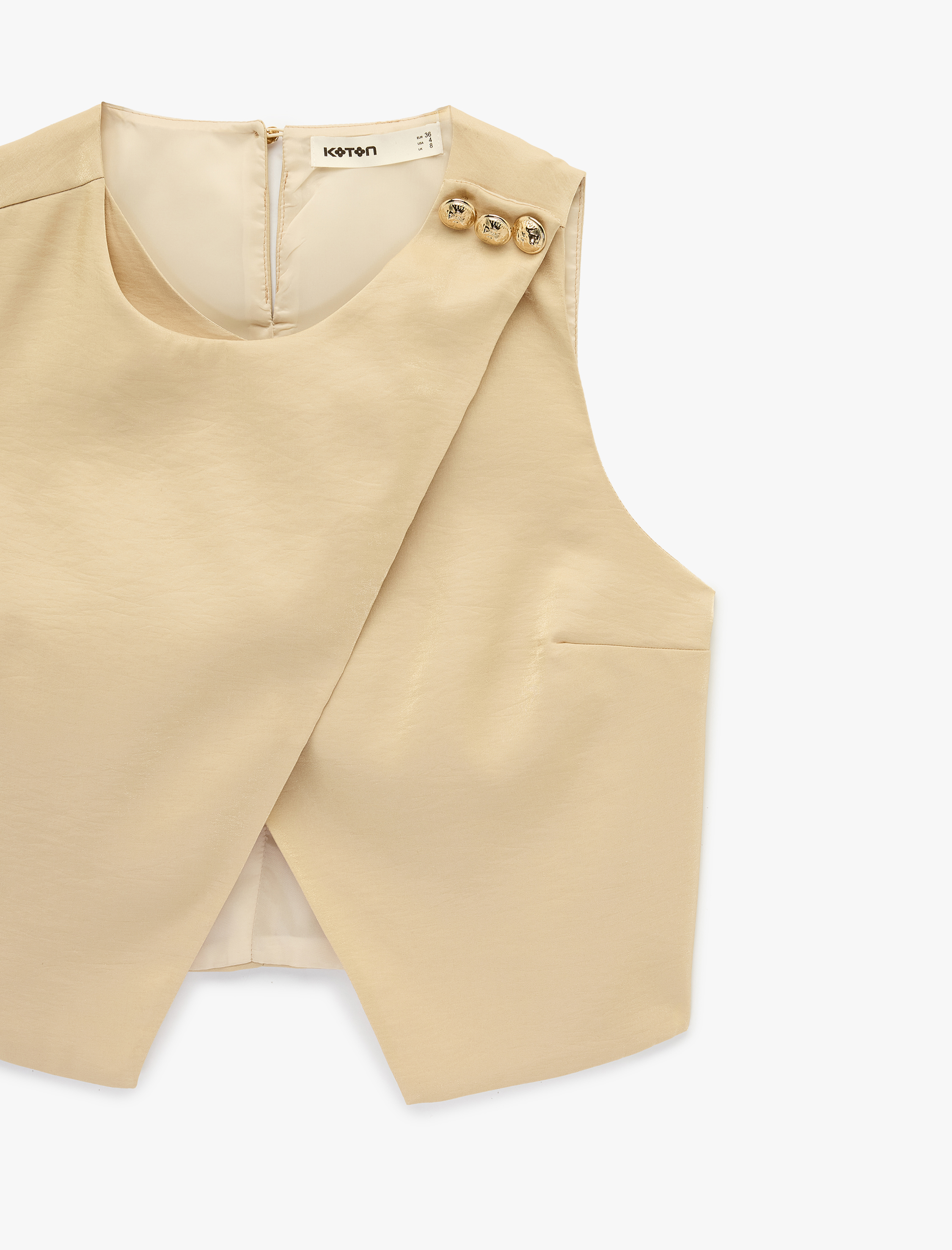   Yuvarlak Yaka Aksesuar Detaylı Asimetrik Kesim Saten Yelek