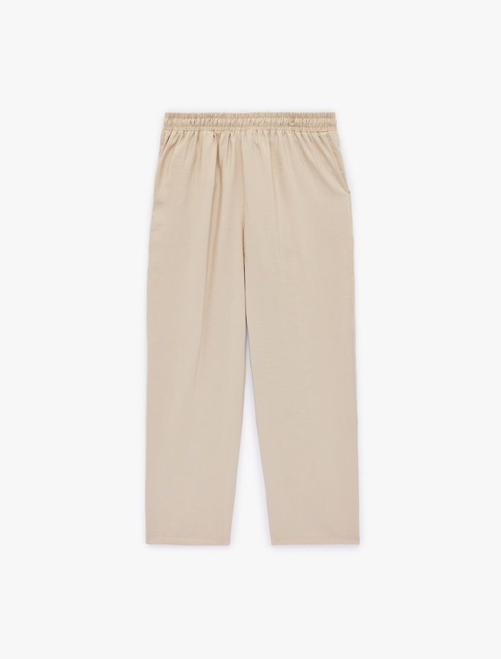  Slim Fit Beli Bağlamalı Cepli Havuç Kesim Pantolon