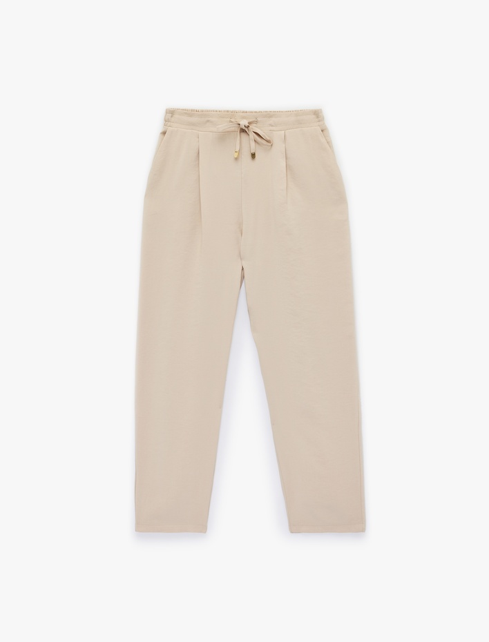  Slim Fit Beli Bağlamalı Cepli Havuç Kesim Pantolon