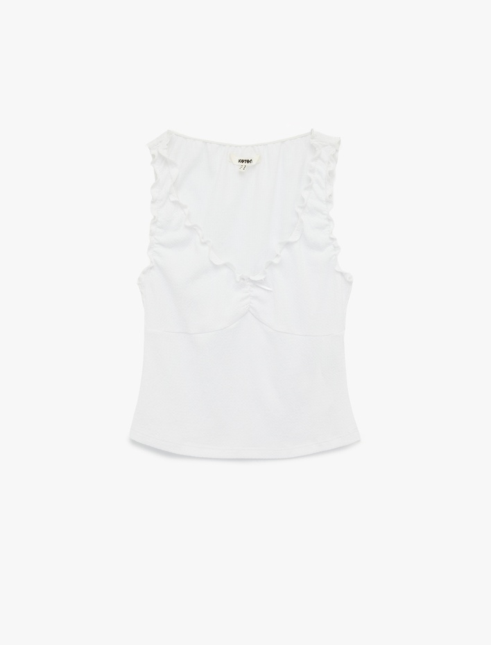  Bürümcük Kumaş V Yaka Fiyonklu Fırfırlı Kolsuz Bluz