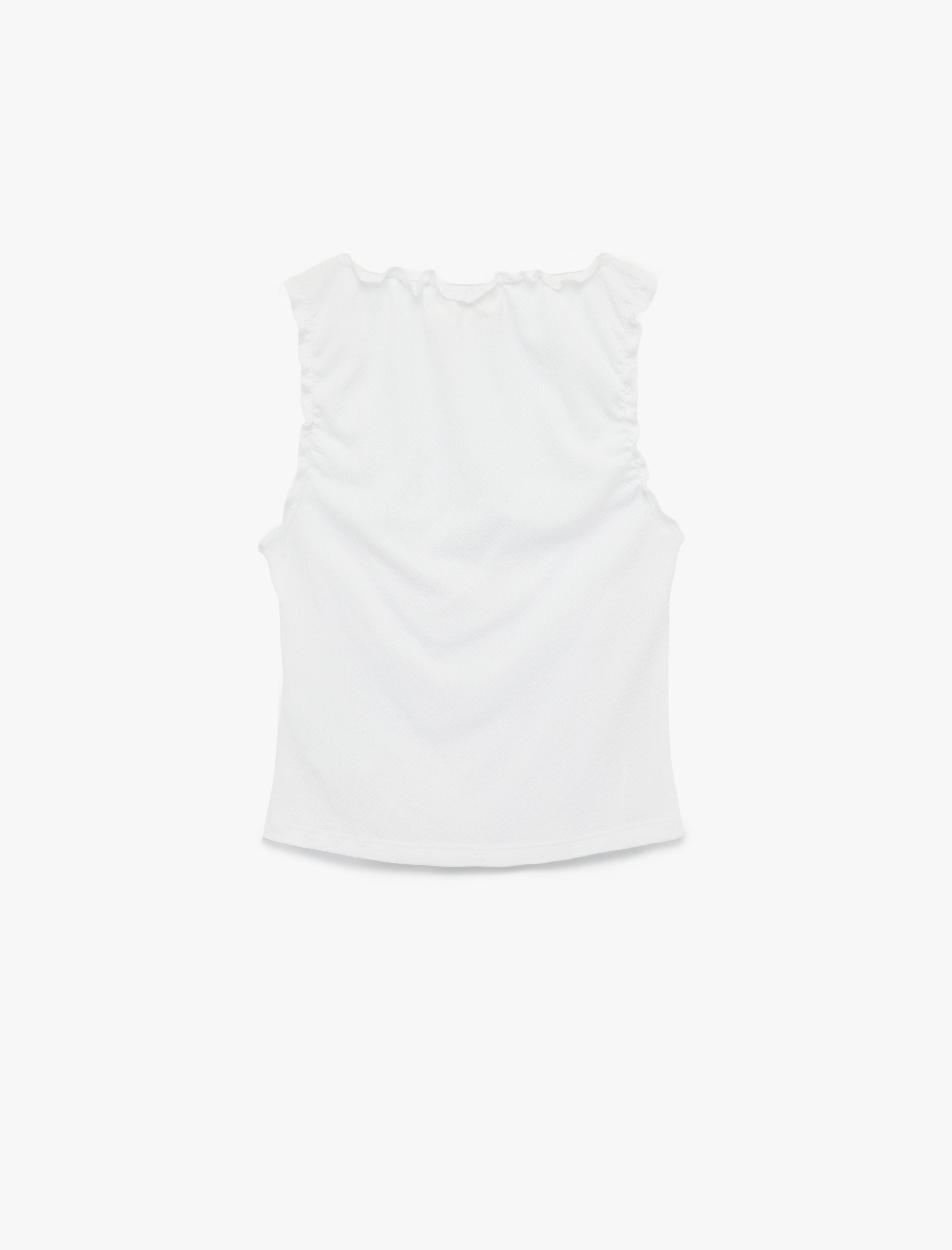   Bürümcük Kumaş V Yaka Fiyonklu Fırfırlı Kolsuz Bluz