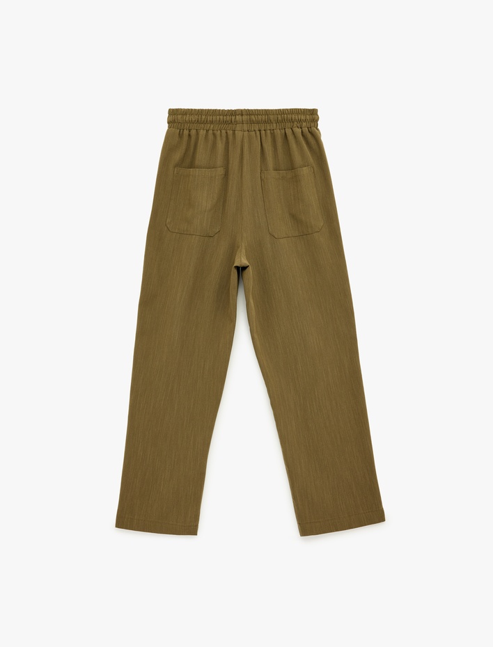  Keten Görünümlü Beli Bağcıklı Cepli Havuç Pantolon