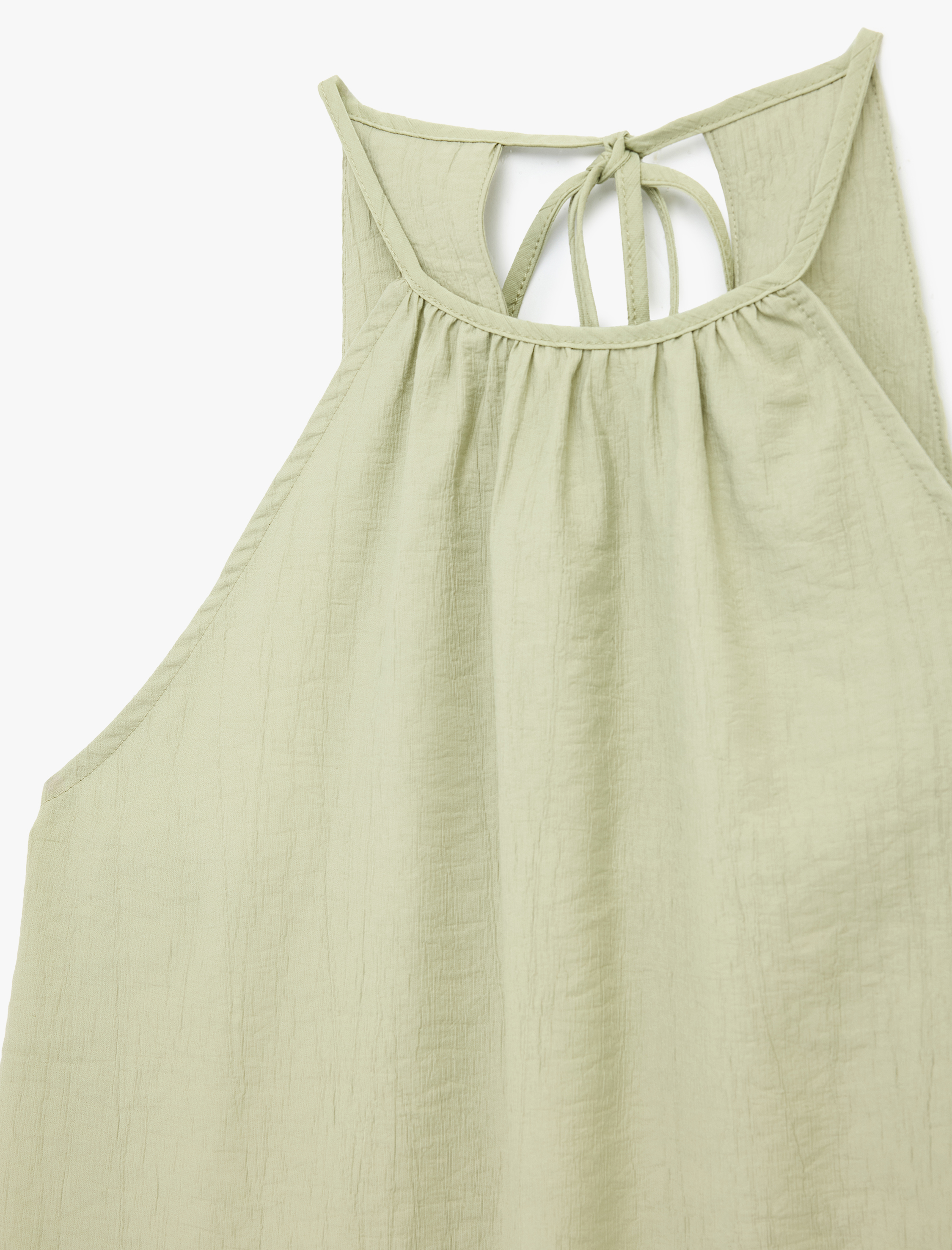   Viskon Karışımlı Kolsuz Bağlama Detaylı Dokulu Halter Yaka Bluz