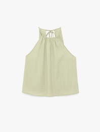 Viskon Karışımlı Kolsuz Bağlama Detaylı Dokulu Halter Yaka Bluz