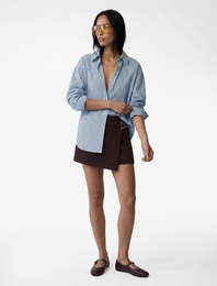 Cepli Metal Aksesuarlı Asimetrik Kesim Mini Şort Etek