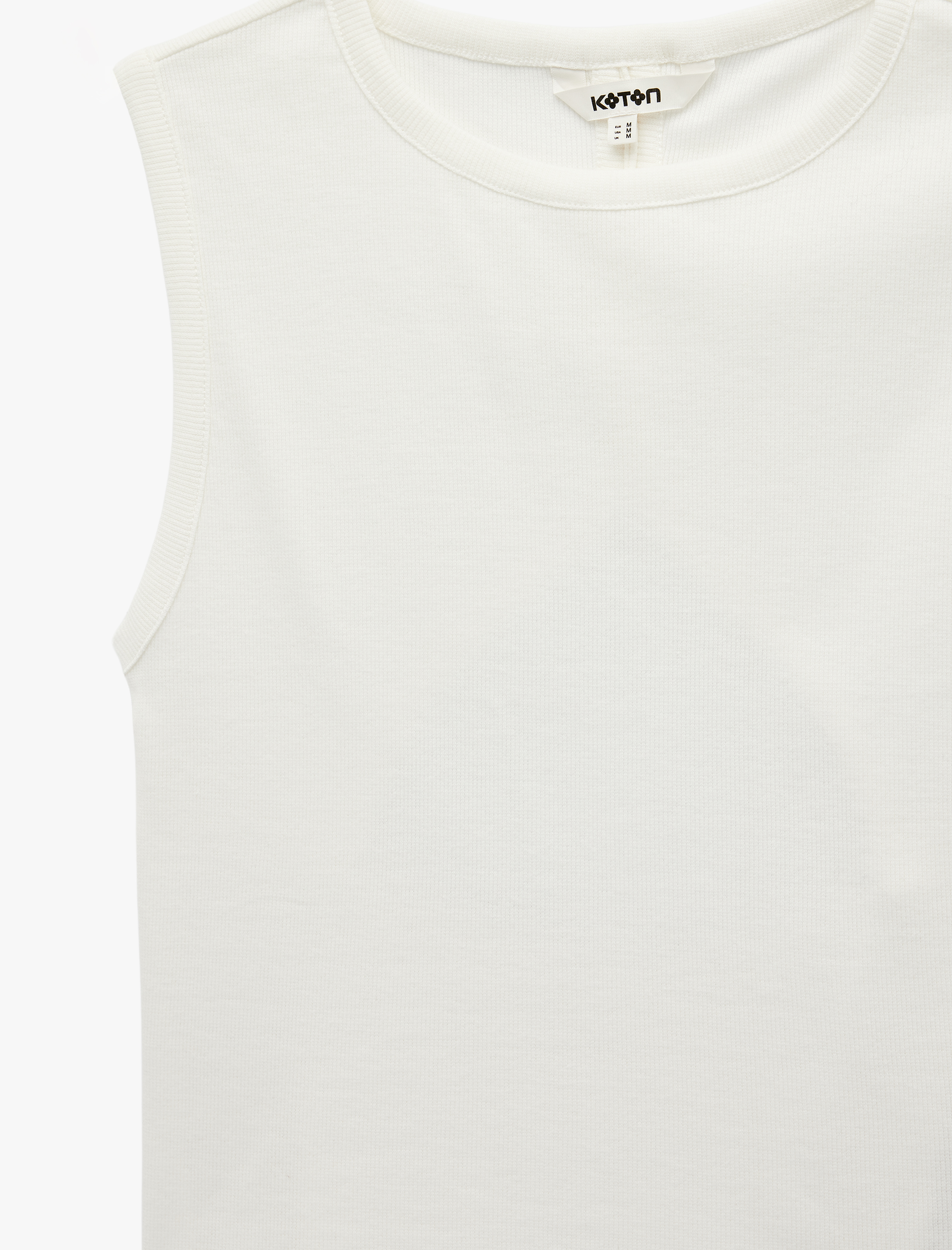   Pamuklu Slim Fit Bisiklet Yaka Kolsuz Arkası Dekolte Detaylı Bluz