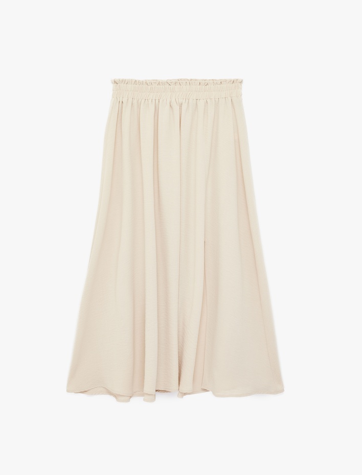  Rahat Kalıp Aerobin Kumaş Beli Lastikli Midi Çan Etek