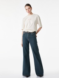 Pamuklu Kısa Kollu Bisiklet Yaka Arkası Ayçiçek Baskılı Oversize Tişört