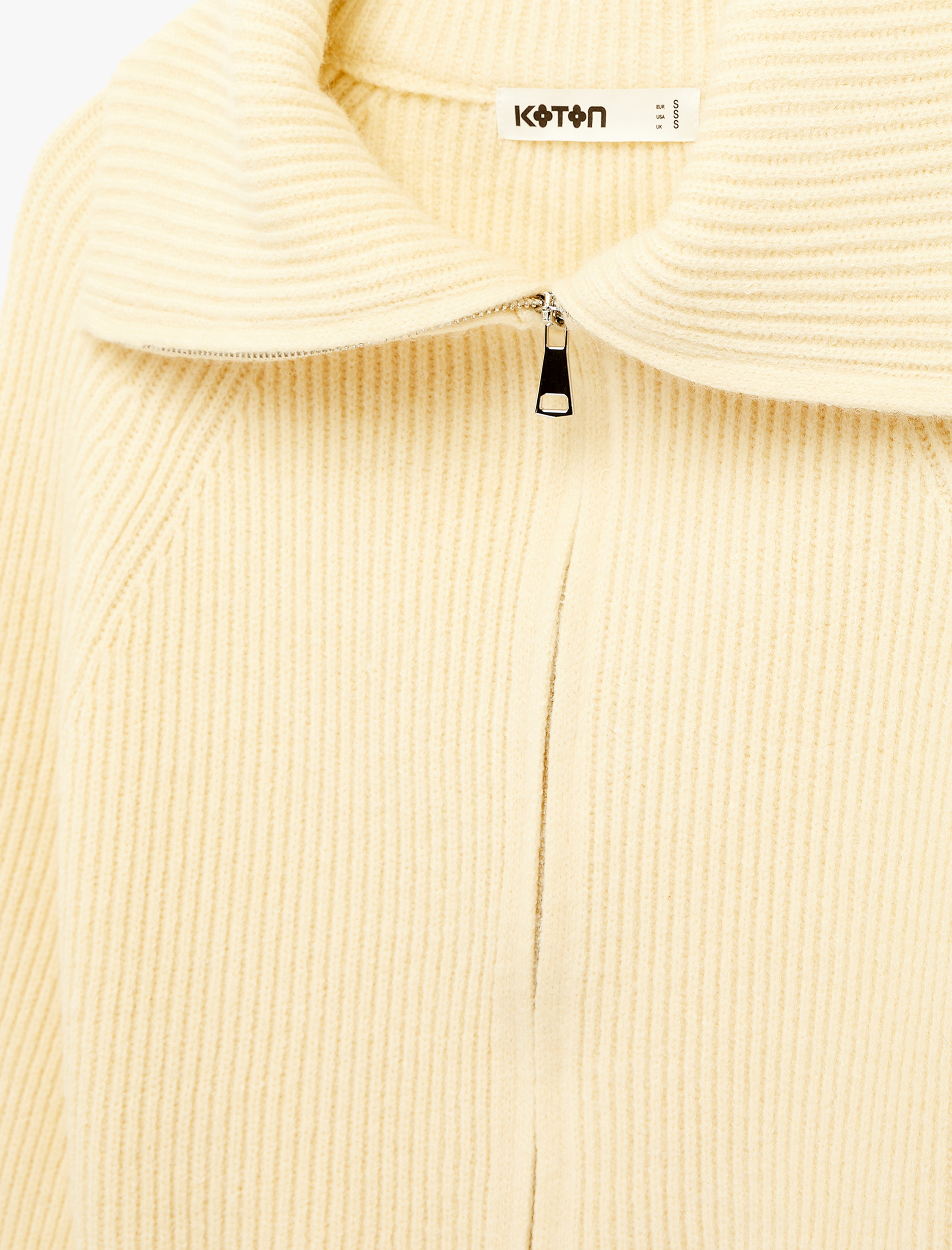   Uzun Kollu Dik Devrik Yaka Fermuarlı Triko Hırka