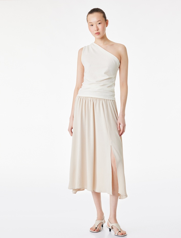  Rahat Kalıp Aerobin Kumaş Beli Lastikli Midi Çan Etek