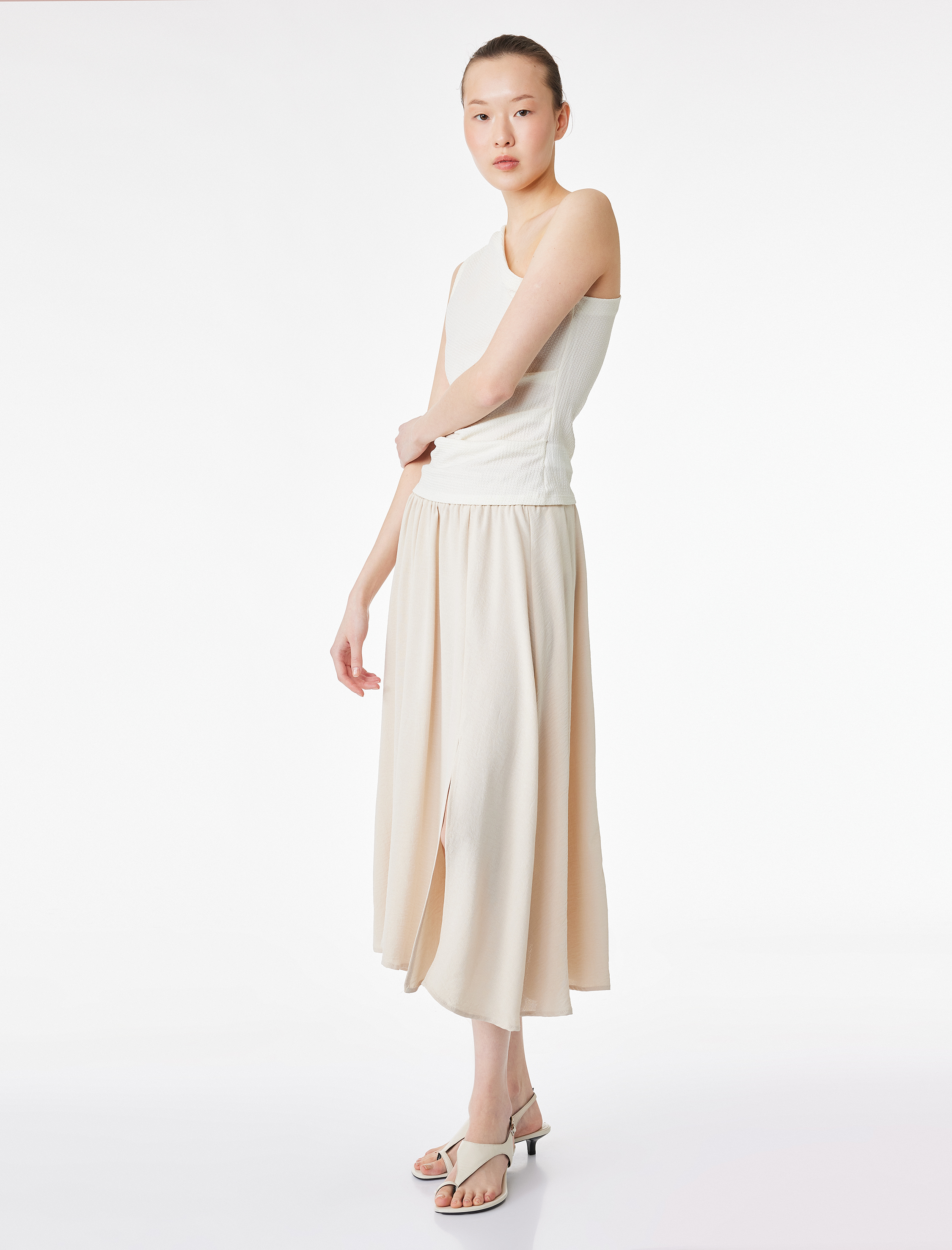   Rahat Kalıp Aerobin Kumaş Beli Lastikli Midi Çan Etek