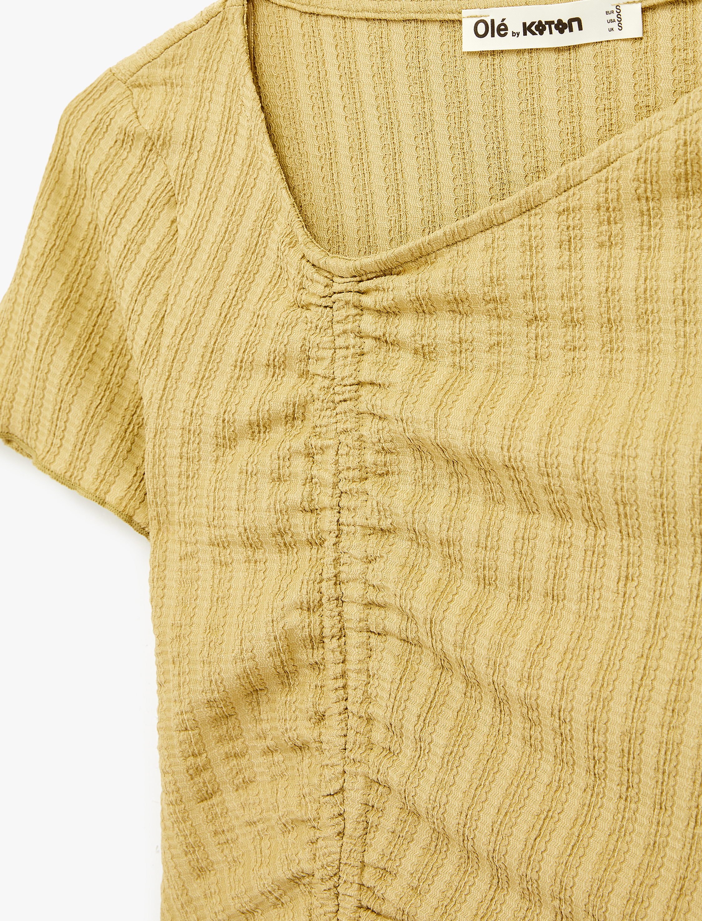   Asimetrik Kesim Büzgülü Kısa Kollu Bürümcük Bisiklet Yaka Bluz