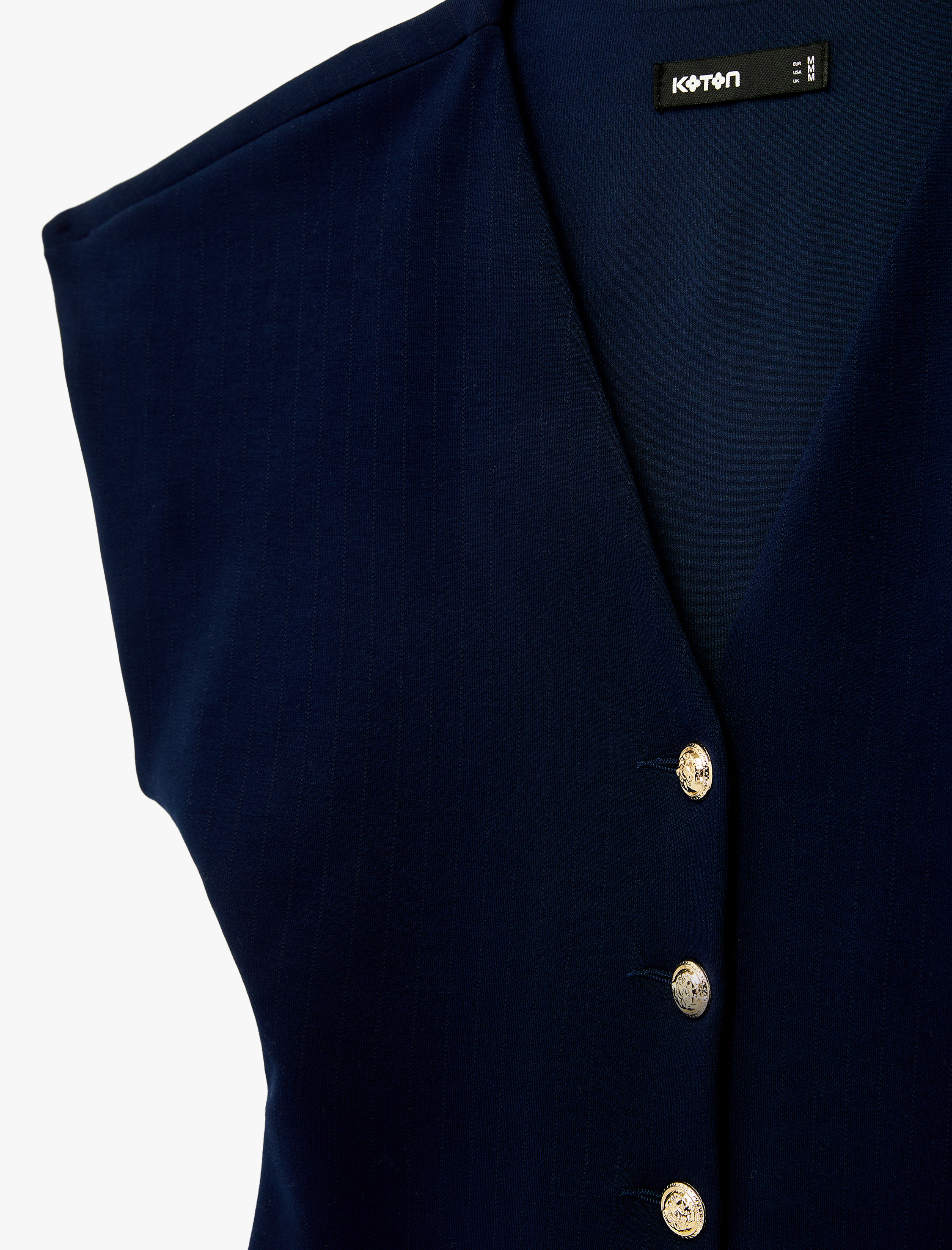   Düğmeli V Yaka Kolsuz Hırka