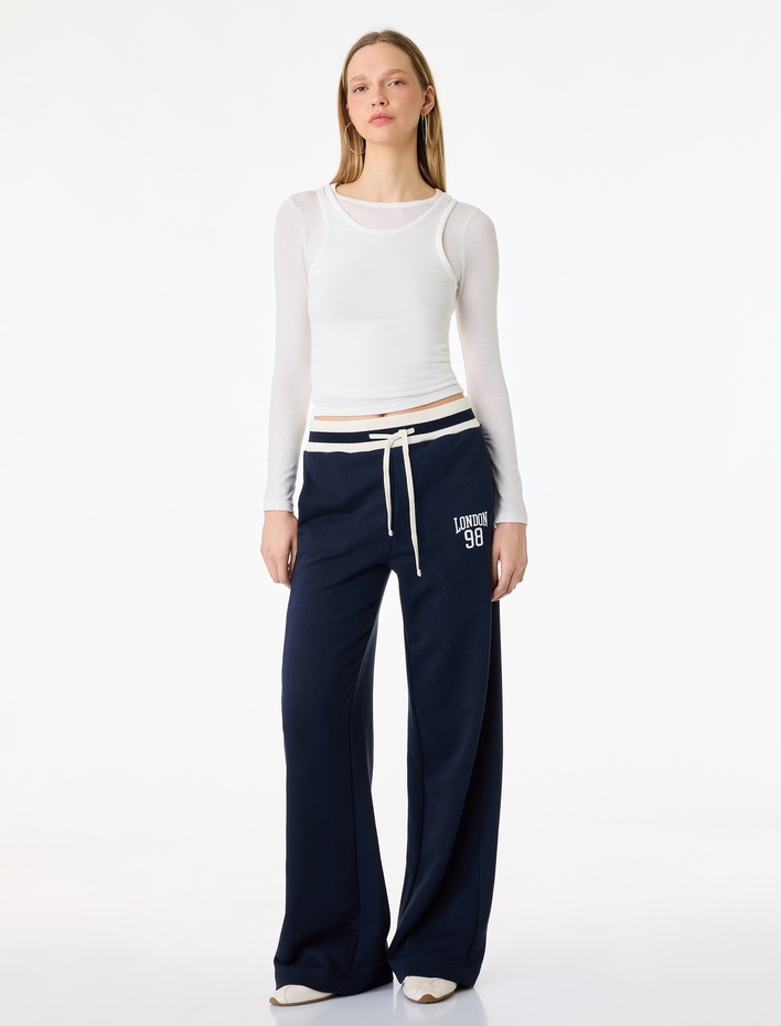  Beli Lastikli Regular Fit Baskı Detaylı Eşofman Altı