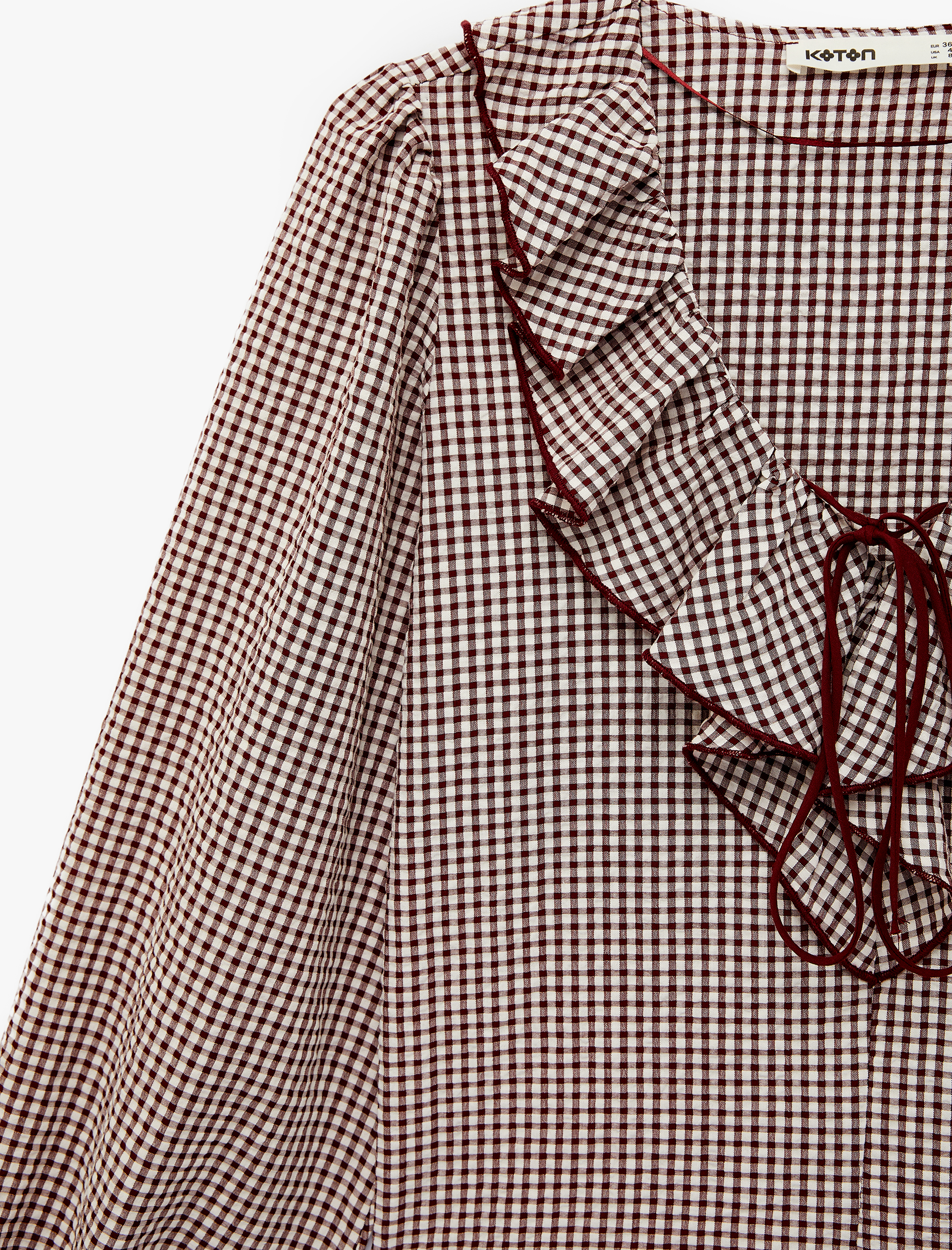   Pamuklu Uzun Balon Kollu Bağlama Detaylı Fırfırlı V Bebe Yaka Pötikareli Bluz