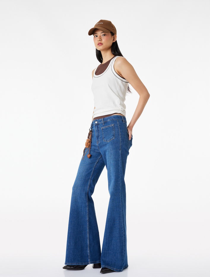  Dar Kesim Cep Detaylı Düğmeli İspanyol Paça Denim Pantolon - Flare Jeans