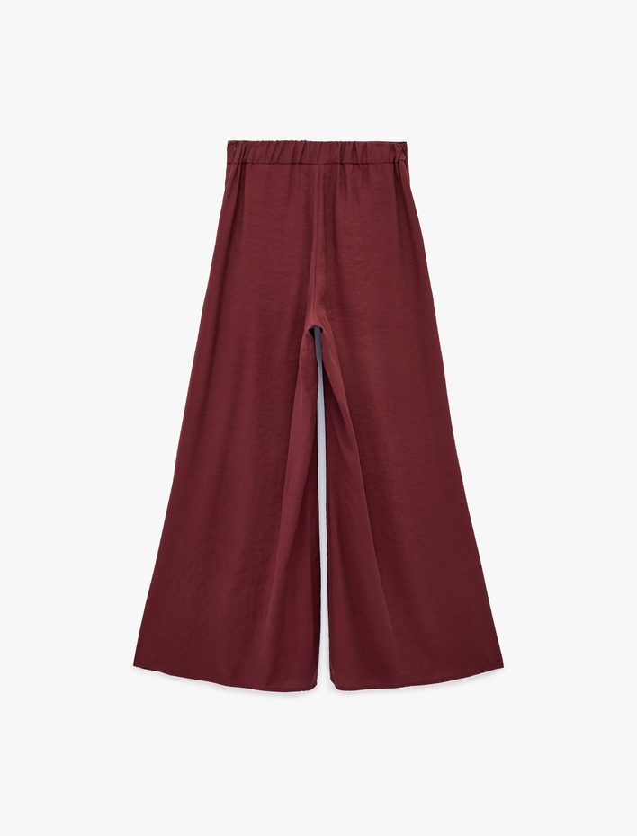  Modal Kumaş Pile Detaylı Geniş Paça Etek Pantolon