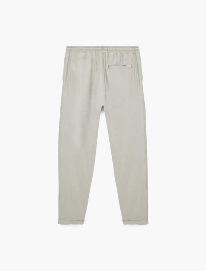  Viskon Cep Detaylı Duble Paça Beli Bağcıklı Pantolon