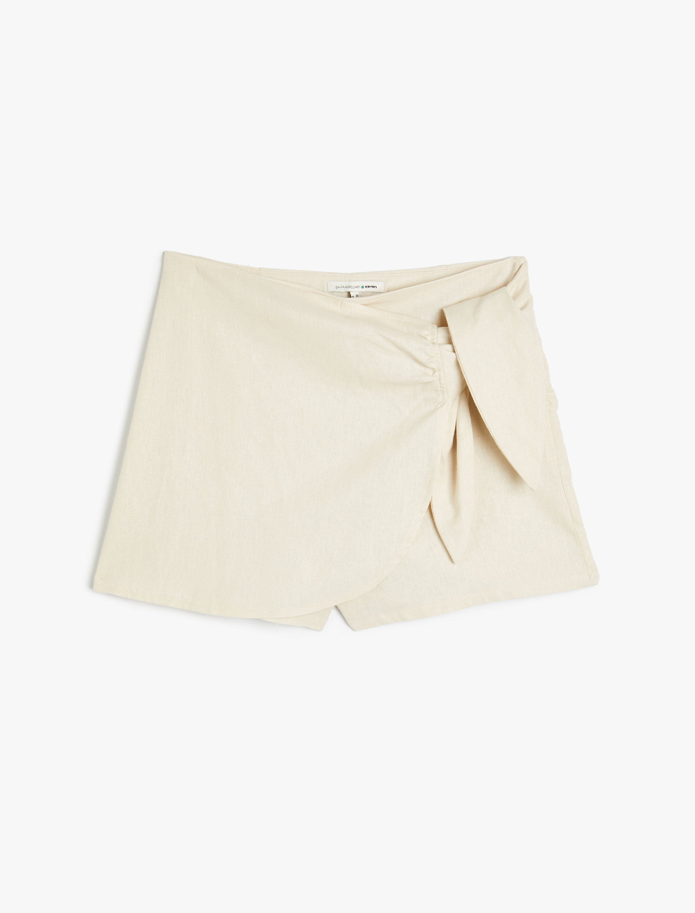   Koton X Şahika Ercümen - Mini Keten Şort Etek Kruvaze Bağlama Detaylı