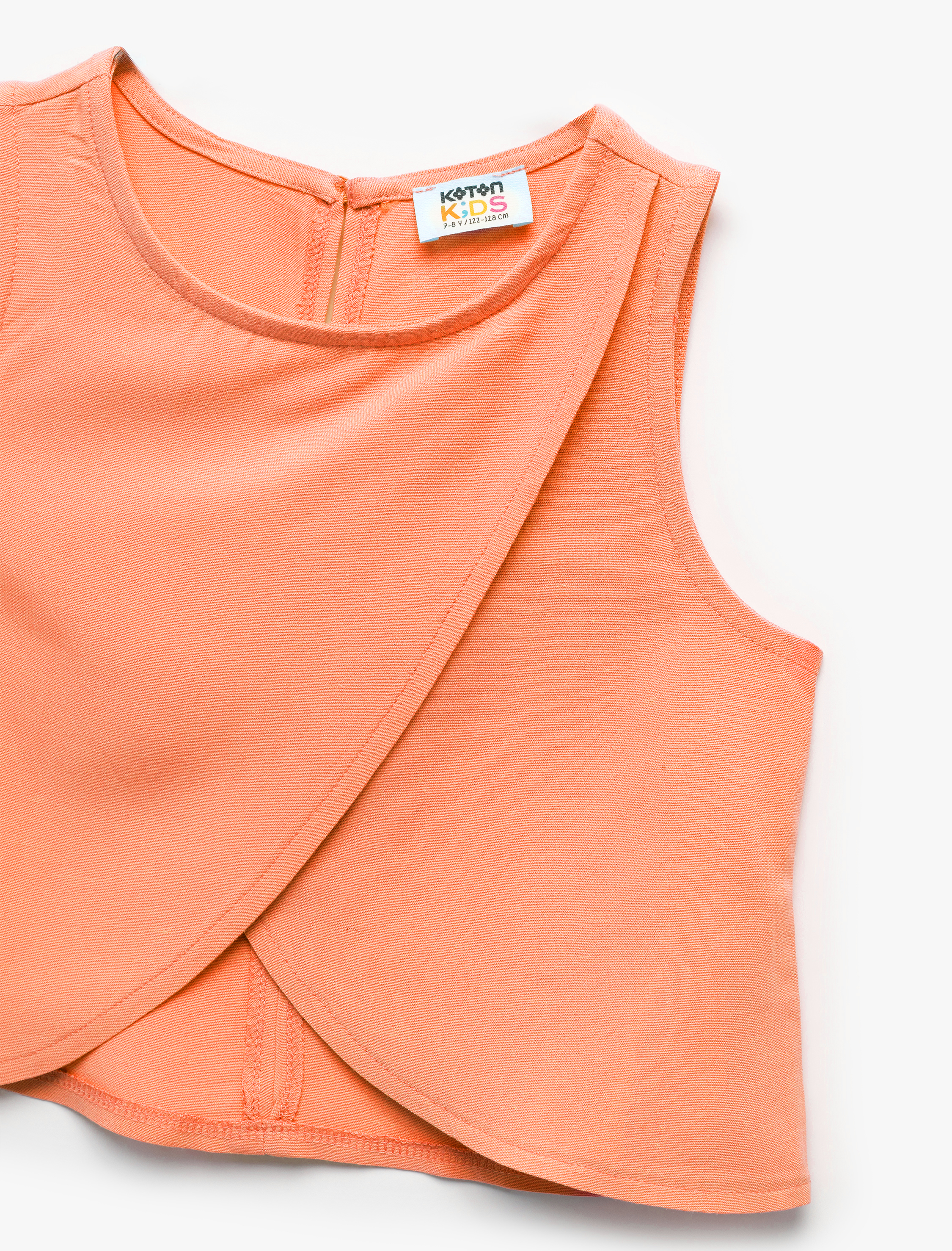  Kız Çocuk Asimetrik Kesim Yuvarlak Yaka Keten Karışımlı Kolsuz Bluz