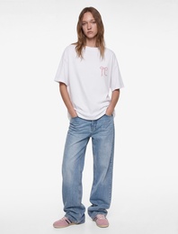 Kısa Kollu Bisiklet Yaka Pamuklu Fiyonklu Arkası Baskılı Oversize Tişört