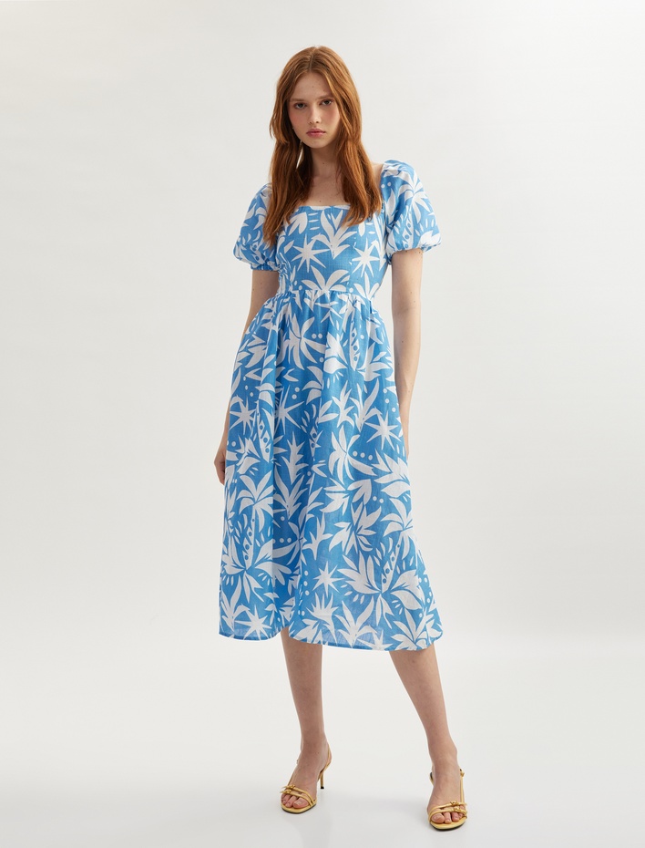  Pamuklu Kısa Balon Kollu Arkası Dekolte Detaylı Midi Boy Çiçekli Elbise