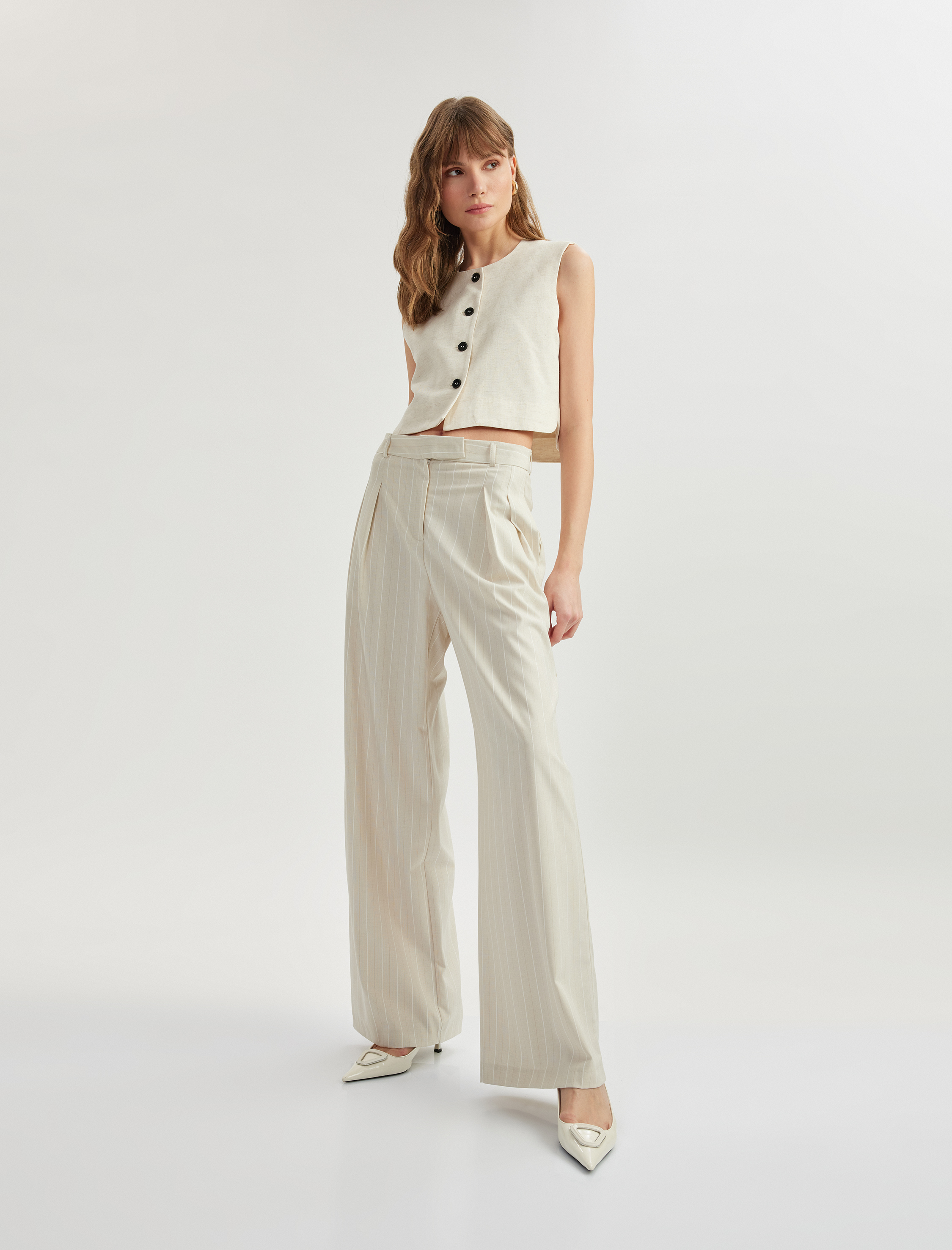   Cepli Pile Detaylı Geniş Paça Kumaş Pantolon