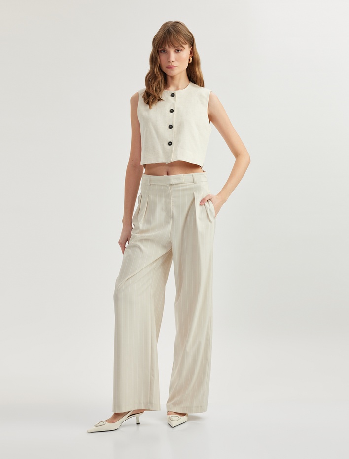  Cepli Pile Detaylı Geniş Paça Kumaş Pantolon