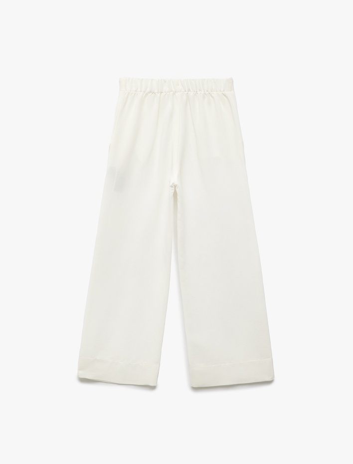 Kız Çocuk Düğme Detaylı Cepli Viskon Karışımlı Geniş Paça Pantolon