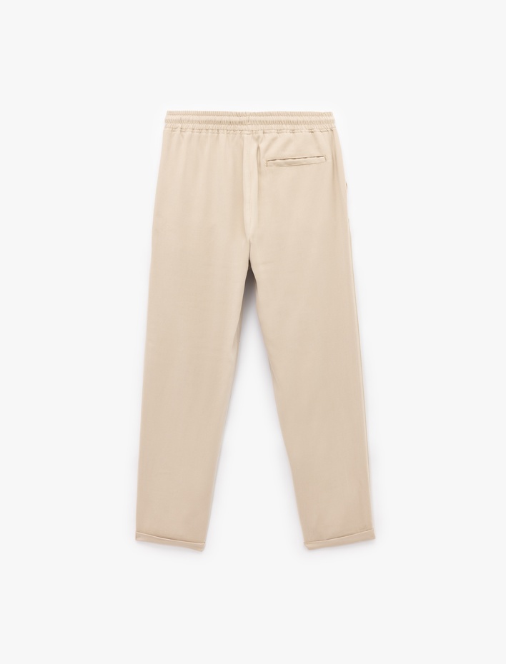  Viskon Cep Detaylı Rayon Tapered Beli Bağcıklı Pantolon