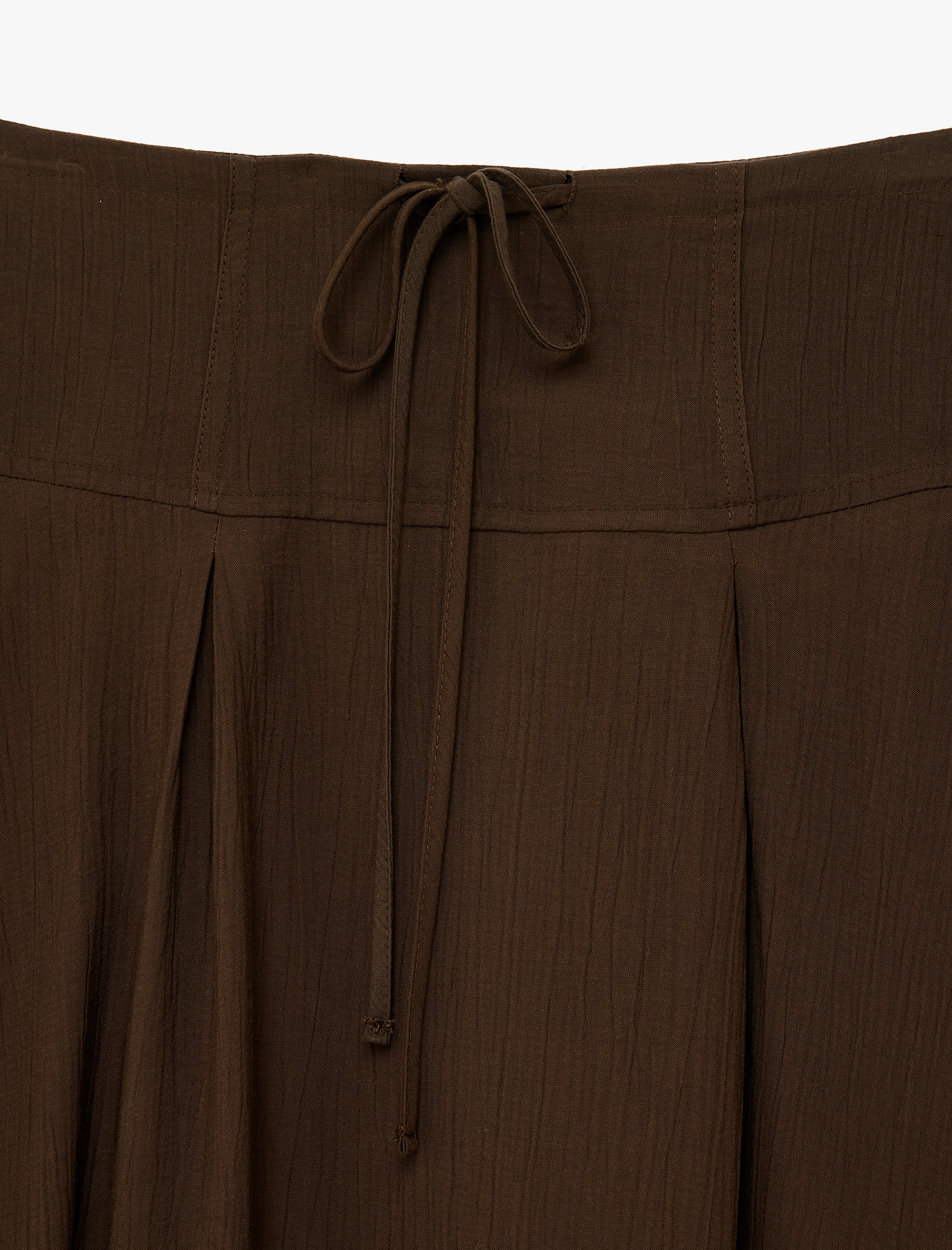   Viskon Kumaş Beli Bağlamalı Dokulu Çan Kesim Midi Etek