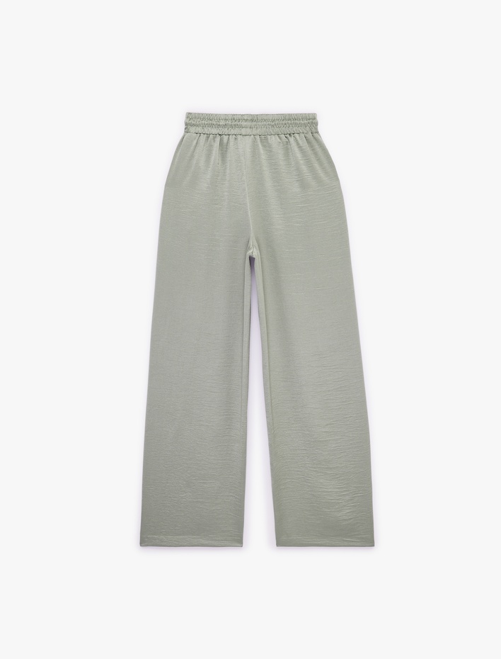  Beli Lastikli Bağlamalı Cepli Düz Geniş Paça Dokulu Saten Pantolon