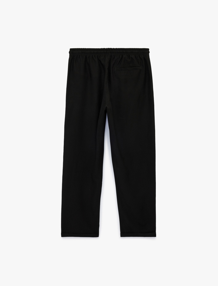  Viskon Cep Detaylı Duble Paça Beli Bağcıklı Pantolon