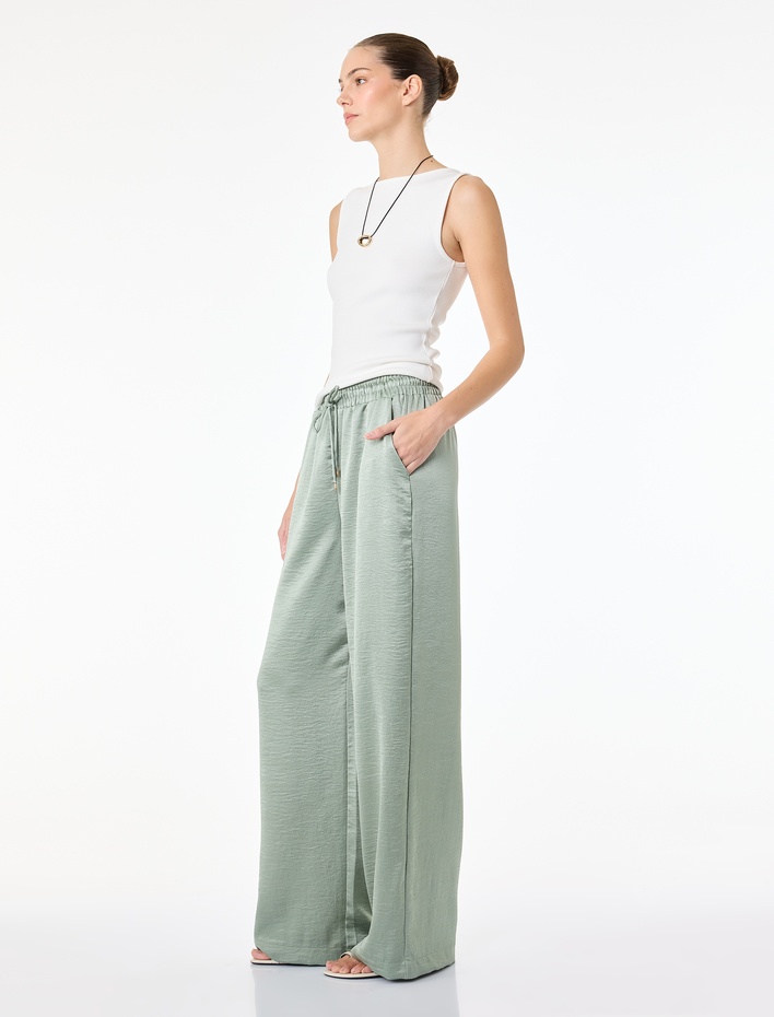  Beli Lastikli Bağlamalı Cepli Düz Geniş Paça Dokulu Saten Pantolon