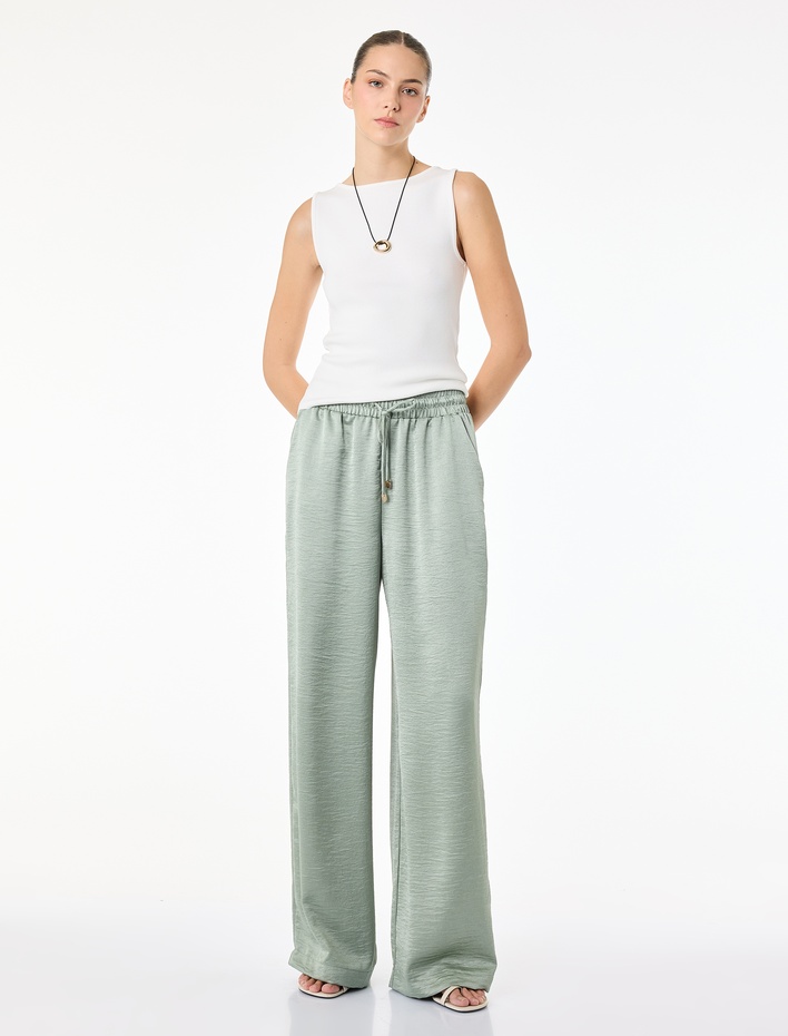  Beli Lastikli Bağlamalı Cepli Düz Geniş Paça Dokulu Saten Pantolon