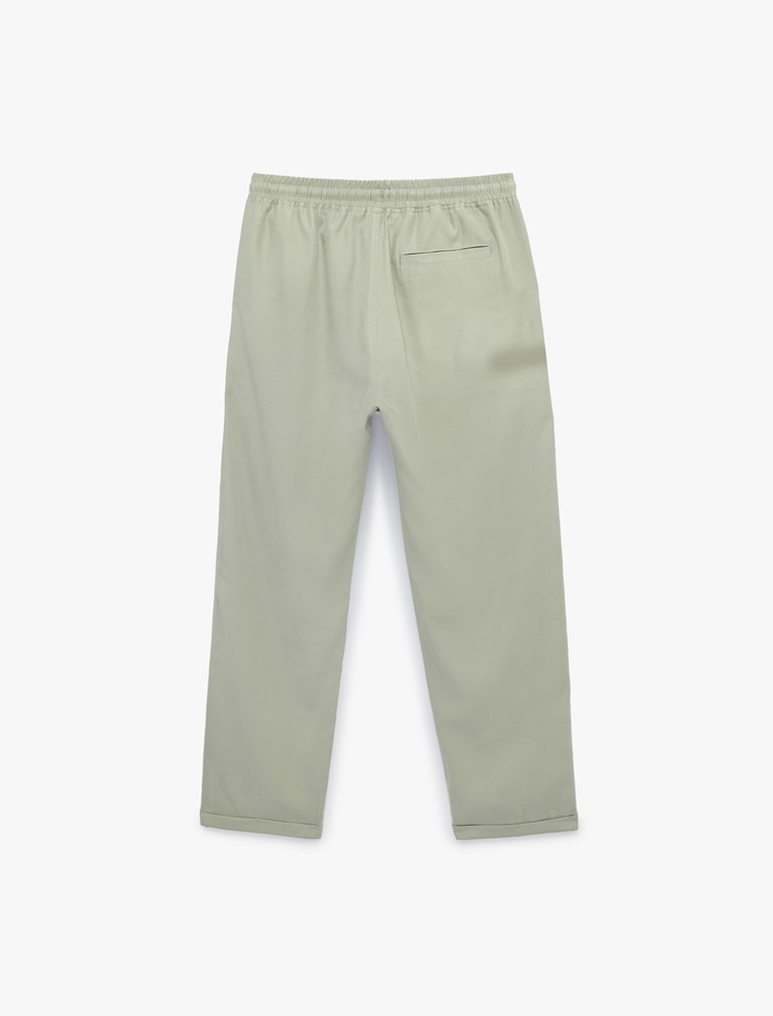  Viskon Cep Detaylı Duble Paça Beli Bağcıklı Pantolon