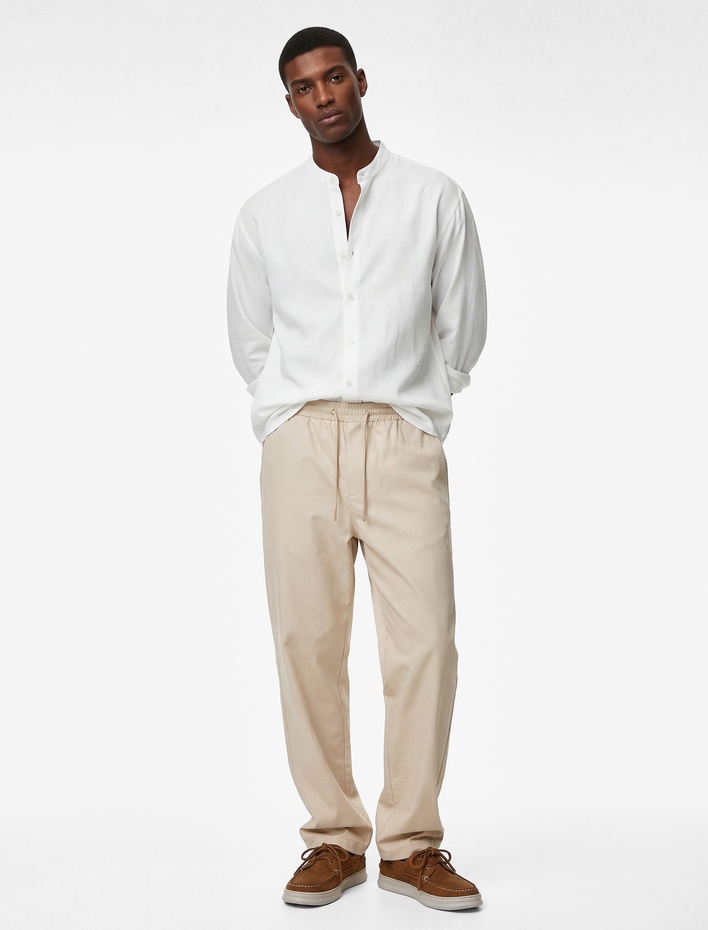  Regular Fit Cepli Pamuklu Pileli Beli Bağcıklı Pantolon