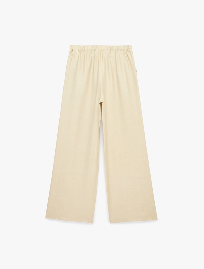  Viskon Bağlama Detaylı Cepli Geniş Paça Palazzo Pantolon