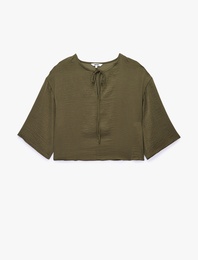 Rahat Kalıp Bağlamalı Yuvarlak Yaka Kısa Kollu Bluz