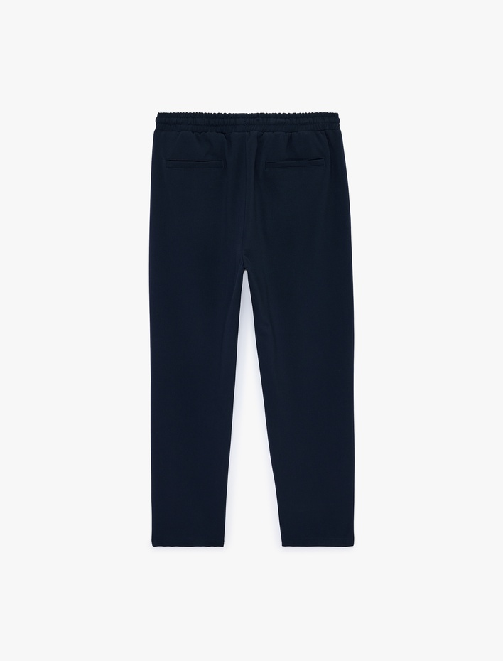  Regular Fit Viskon Karışımlı Cepli Beli Bağcıklı Kumaş Pantolon