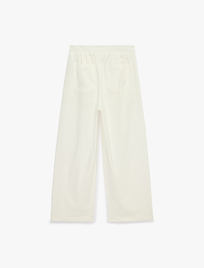  Beli Lastikli Gabardin Cepli Balon Pantolon